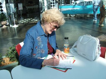 Natalie checks list